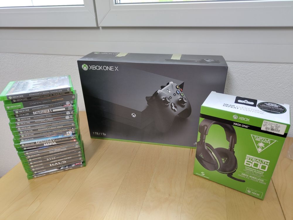 Xbox One X & Headset & Game Collection (21) Kaufen auf Ricardo