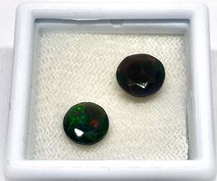 2x Opales noires 8 mm - Valeur 180.- Fr