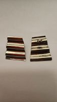 jolies boucles d' oreilles,  originales.