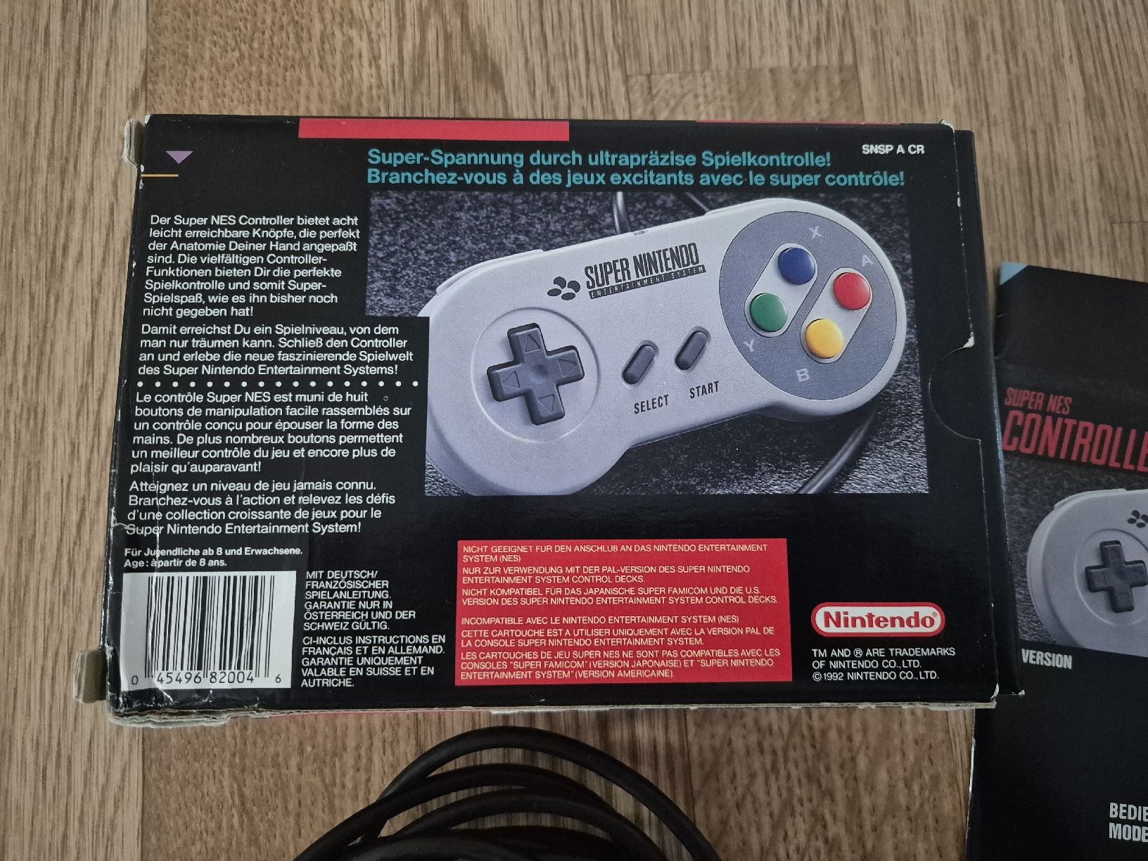 Nintendo Manettes: Super Nintendo Controller mit OVP und Anleitung – D'occasion à Gümligen par kurt2591989 2