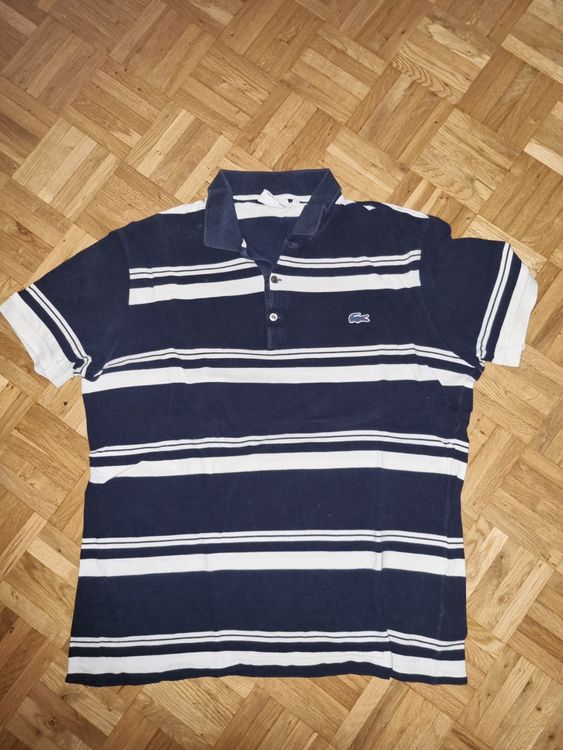 Polo lacoste taille 7 Comprare su Ricardo