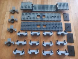 Lot de pièces LEGO train roues wagons gris