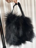 Sac noir en fourrure véritable très volumineux