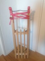 Holzschlitten