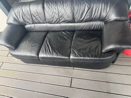 Schwarzes Ledersofa