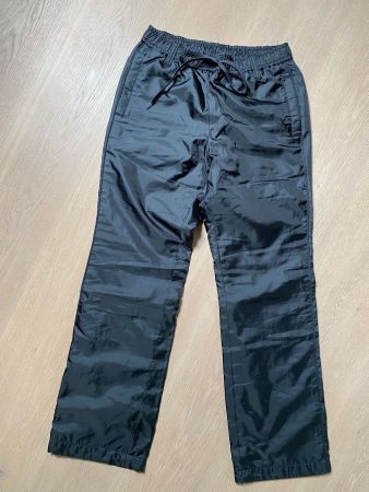 Gefütterte schwarze Hose von Uniqlo Grösse S