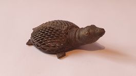 Schildkröte aus Metall.
