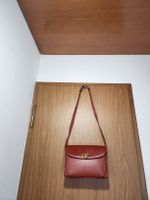 Sac pourchet à main  en cuir 