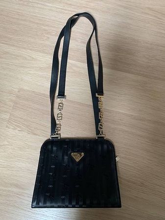 Mollerus Hndtasche mit Tragegurt Schwarz / Gold