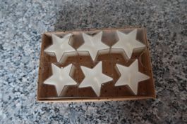 Weihnachtskerzen Sterne