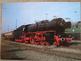 Deutsche Dampflok 01 150 mit einem Teakholz-Speisewagen.