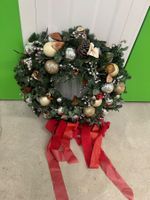 Christmas wreath green with silver ornaments and ribbon