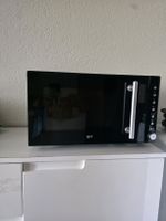 Mikrowelle schwarz neuwertig mit Zubehör