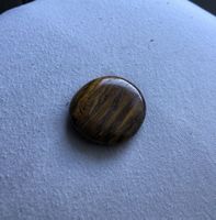 Pierre polie oeil de tigre forme ronde bon état