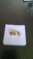 Goldfarbiger Ring mit Zirkoniasteinreihen - Grösse 60