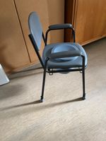 Toilettenstuhl mit Armlehnen grau gepolstert guter Zustand