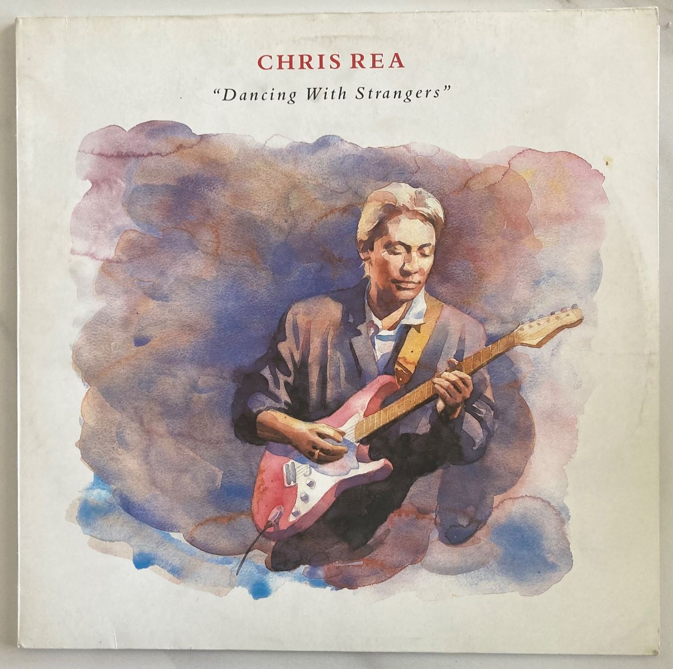 Vinyles: CHRIS REA - DANCING WITH STRANGERS – D'occasion à Poliez-Pittet par Newtown-Records