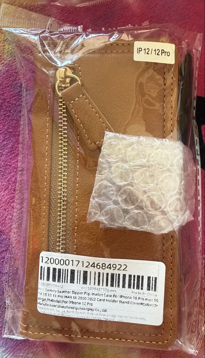 Coques & Protection écran: iPhone  IP 12 / 12 Pro Leder Wallet Case neu – Neuf avec emballage d'origine à Basel par Cora3