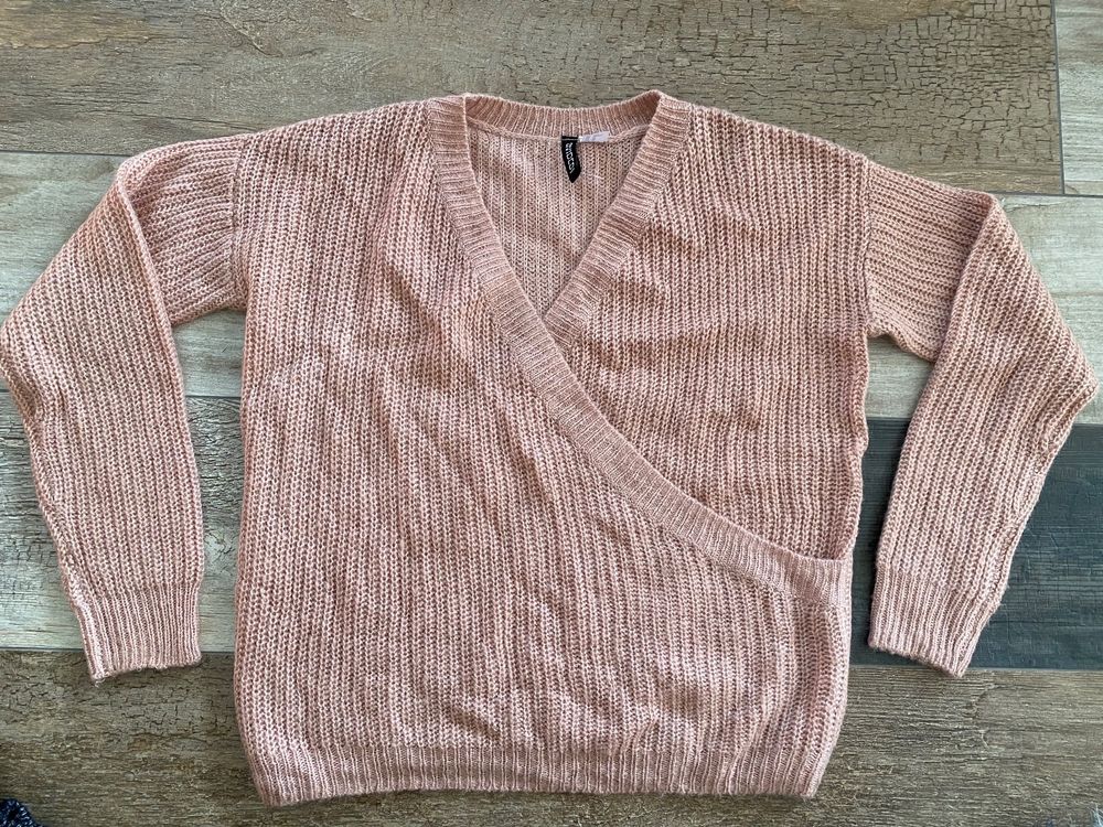 H M pull rose cache c ur XS Acheter sur Ricardo