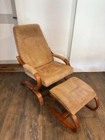 Sessel mit Fußhocker
