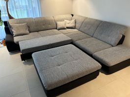 Ecksofa mit Bettfunktion und Hocker grau schwarz gepflegt