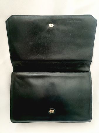 Elegante pochette vintage in vera pelle nera