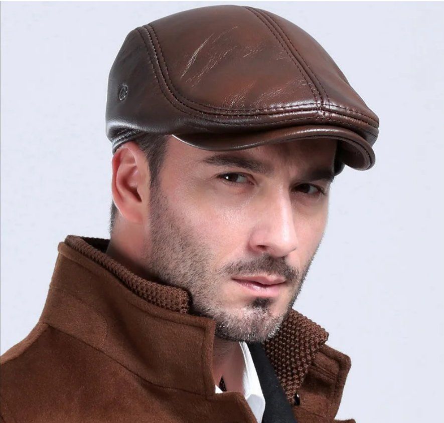 Copricapi, berretti & cappellini: Baskenmütze aus Leder mit Ohrenschutz – Nuovo e nell'imballaggio originale da Lausanne venduto da FASHION-WORLD-SHOP 2