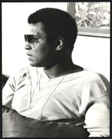 Fotografie Boxer Muhammad Ali mit Sonnen
