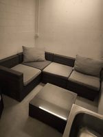 Rattan Lounge mit Sessel und Tisch