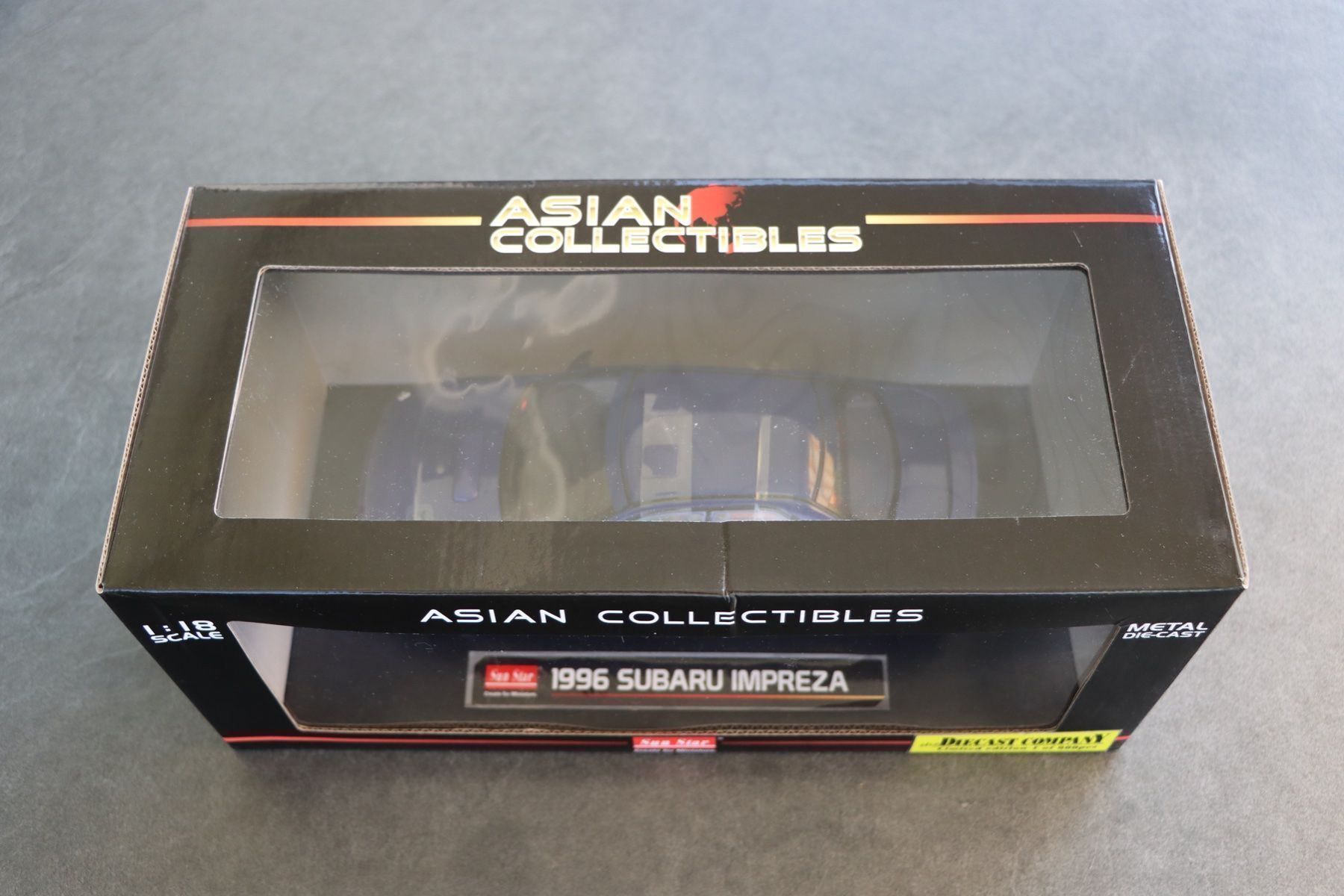 Subaru Modellini d'auto: Subaru Impreza 1996 1:18 SunStar – Nuovo e nell'imballaggio originale da Bühl b.Aarberg venduto da modelldiecast 1
