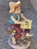 Vintage Porzellan Figur Knabe mit Punze N 16x9 cm
