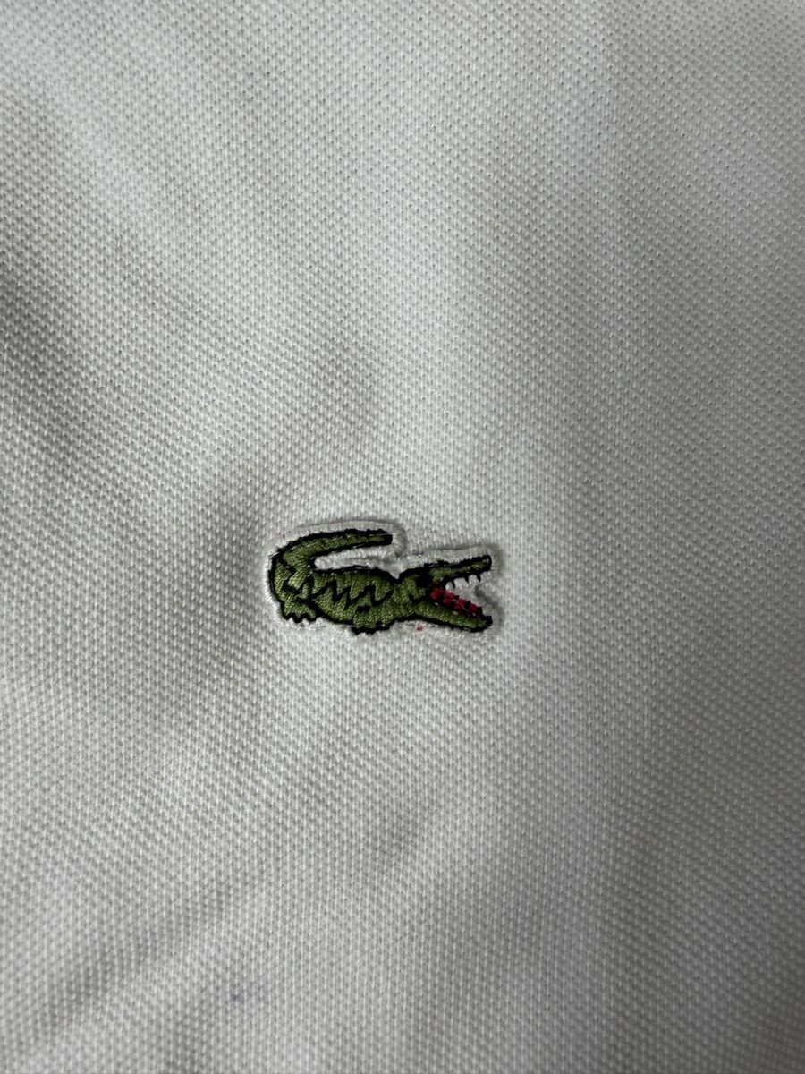 Lacoste Polos: Polo Lacoste Blanc Classique - L #9 – Neuf (Voir description) à Hauterive NE par Leo_o 1