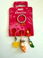 NICI Beauties - Schlüsselanhänger - Orange Raupe