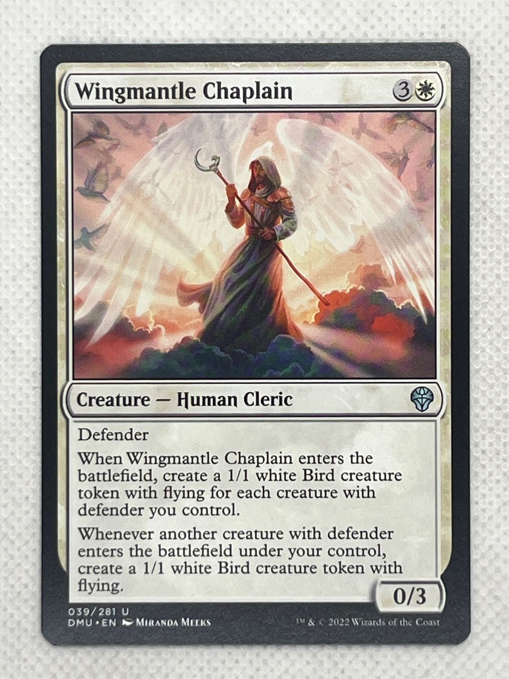 Magic The Gathering Cartes à collectionner: MTG Wingmantle Chaplain DMU 039/281 Englisch Uncommon – D'occasion à Hinterkappelen par Kim1992