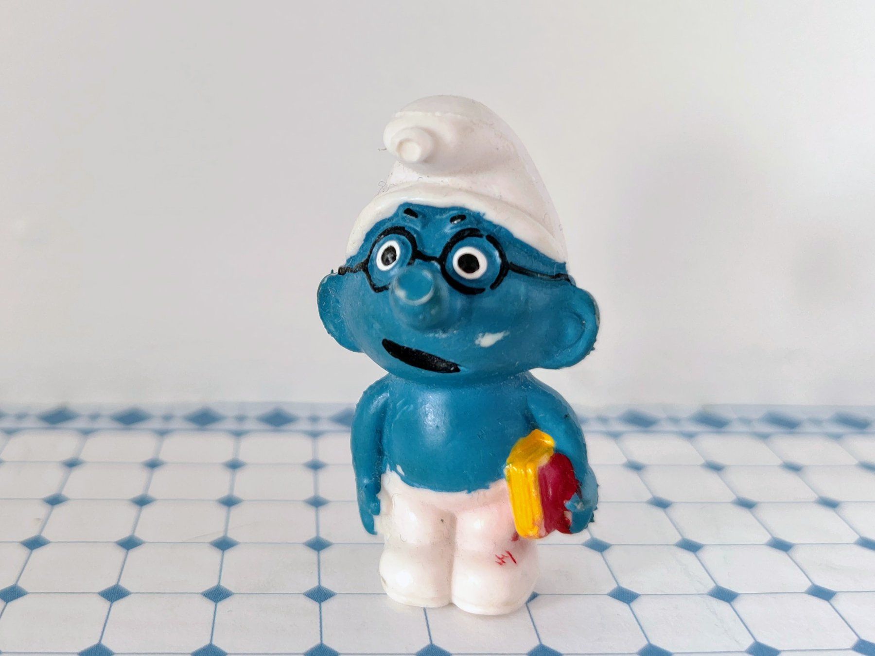 Statuette: Schlumpf (Fake) Schlaubi mit Buch – Usato da Rüti ZH venduto da Prostias