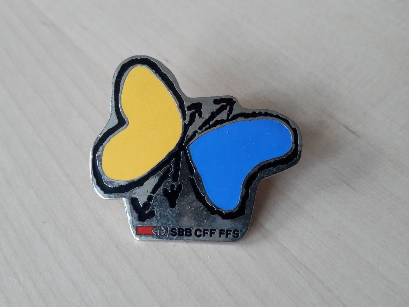 SBB/CFF/FFS Placchette & Badge: Pin's publicitaire des CFF  "papillon" – Usato da Buttes venduto da sylvain106