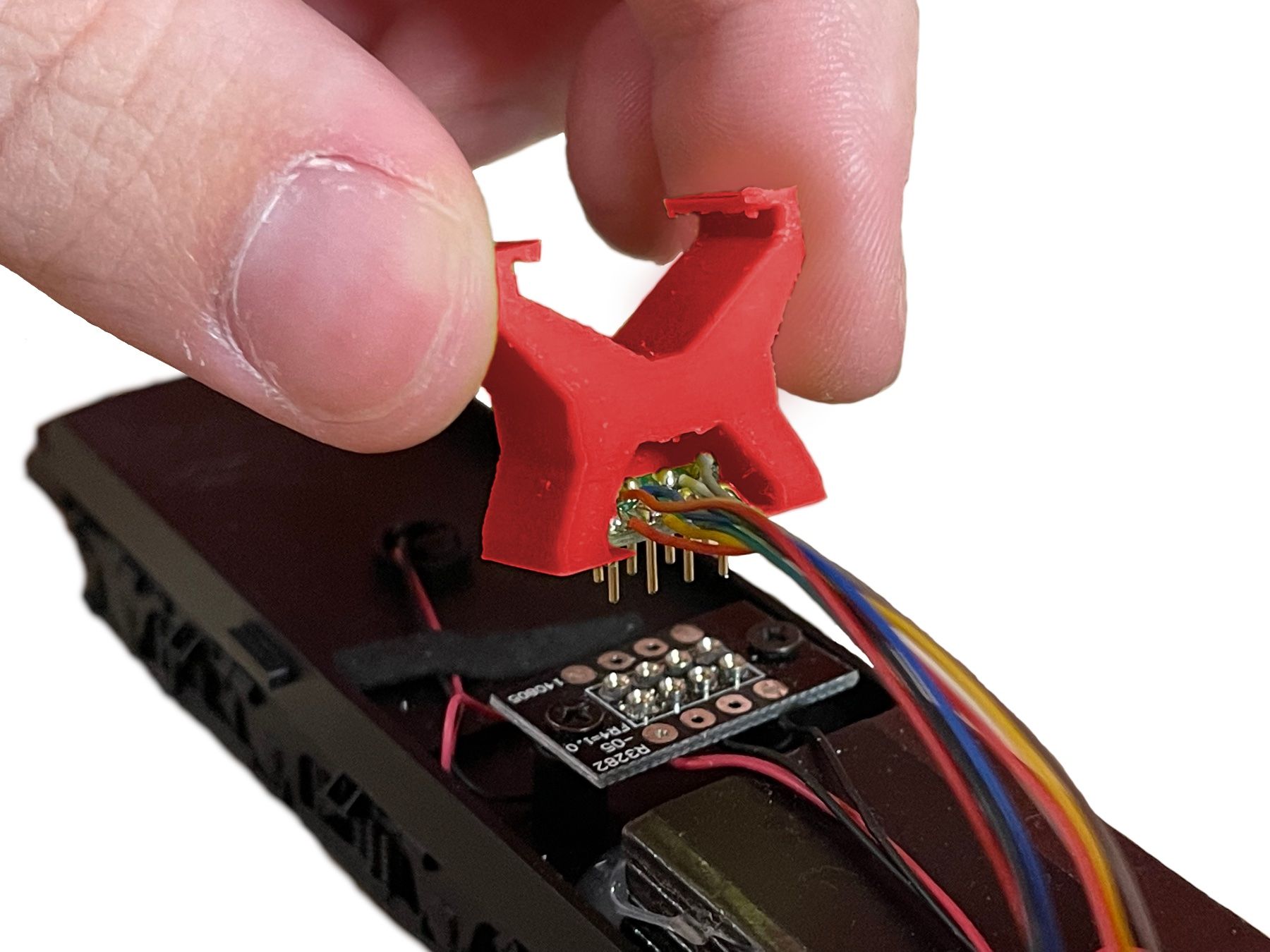 Modellini di ferrovie: Decoder-Entfernungshilfe für NEM 652, PluX22 & 21MTC – Nuovo e nell'imballaggio originale da Brügg BE venduto da telegraphrail