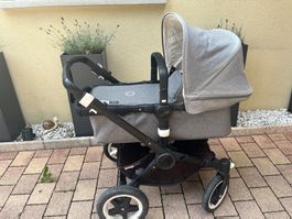 Bugaboo Kinderwagen mit Babyschale, Aufsatz für Sitzposition