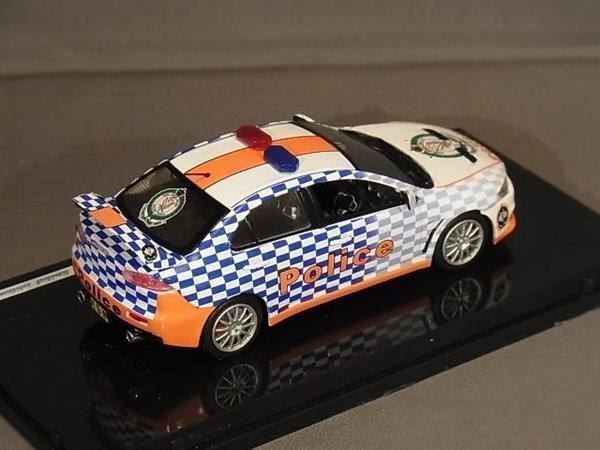 Mitsubishi Modellini d'auto: Mitsubishi Lancer Evolution X 2009-2016 "Police Australien – Nuovo e nell'imballaggio originale da Gerlafingen venduto da espero88 8