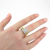 Gliederring aus Bicolor-Gold 18 Kt mit Diamanten