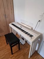 Piano numérique Kawai ES7 avec triple pédale et banquette
