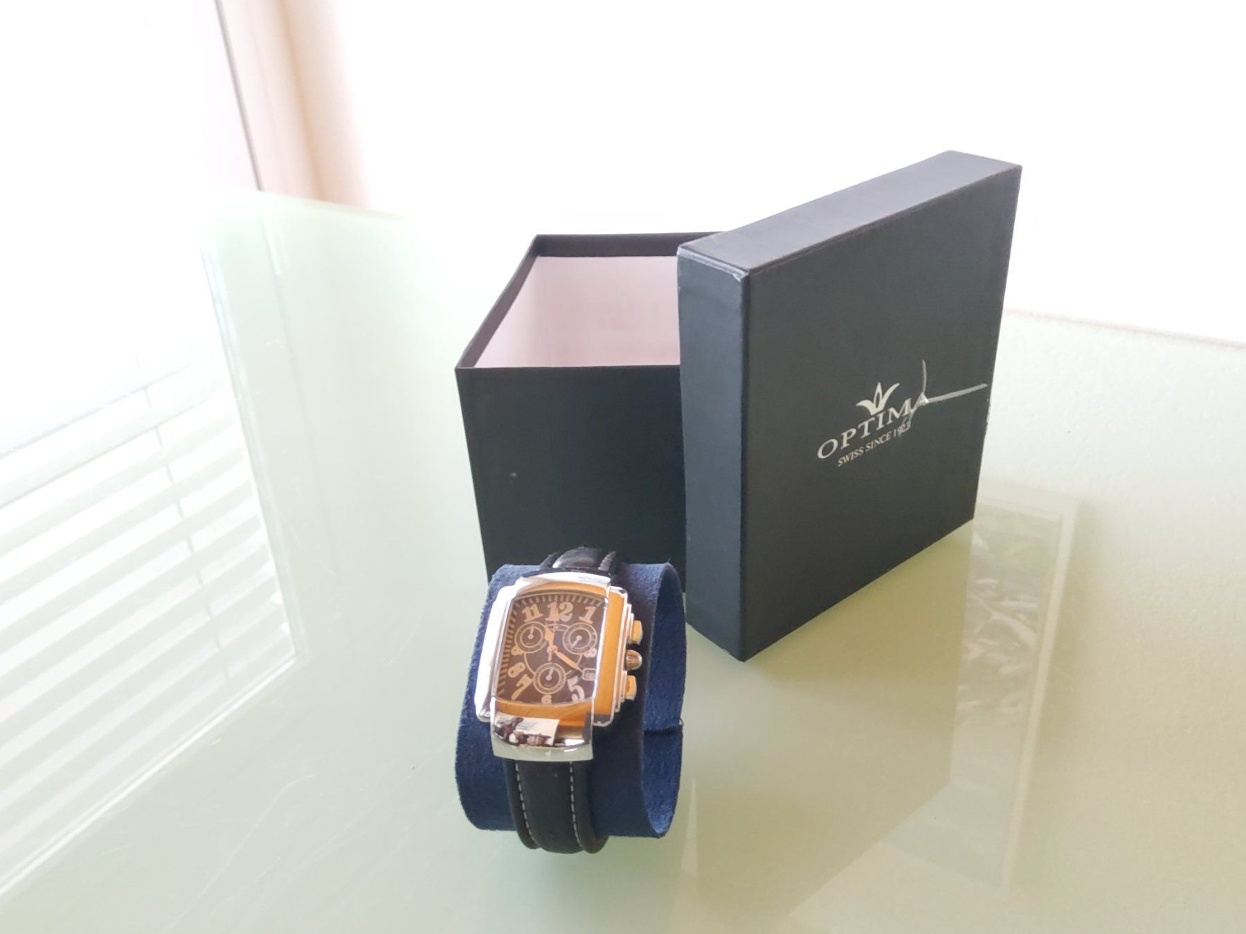 Uhren: Montre bracelet Optima  – Defekt aus Malleray von Broc-Mo