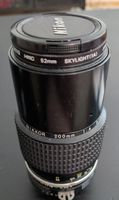 Nikon Nikkor 200mm 1:4 lens with 52mm filter from 1981