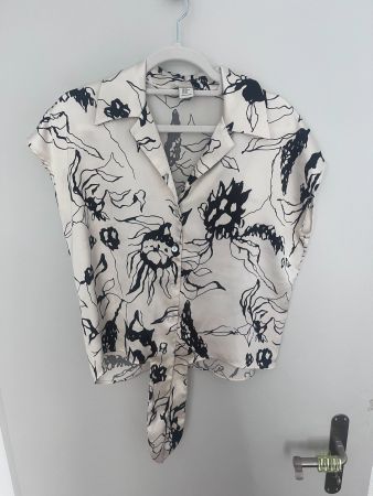 White blouse with black flowers