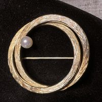 Brosche Gelbgold 14kt mit Perle