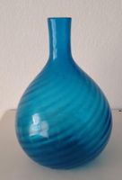 Magnifique vase bleu avec des reffets en parfait état
