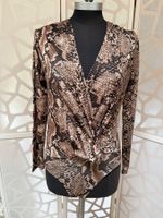 Great ‘body’/top with long sleeves. S