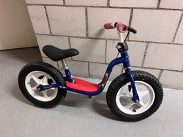 Vélo draisienne Puky bleu et rouge bon état
