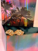 Gucci gold cufflinks - tiger head in gold with diamonds