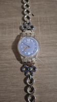 Montre femme Swatch bracelet acier